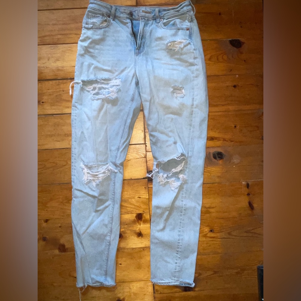 Light blue ripped jeans